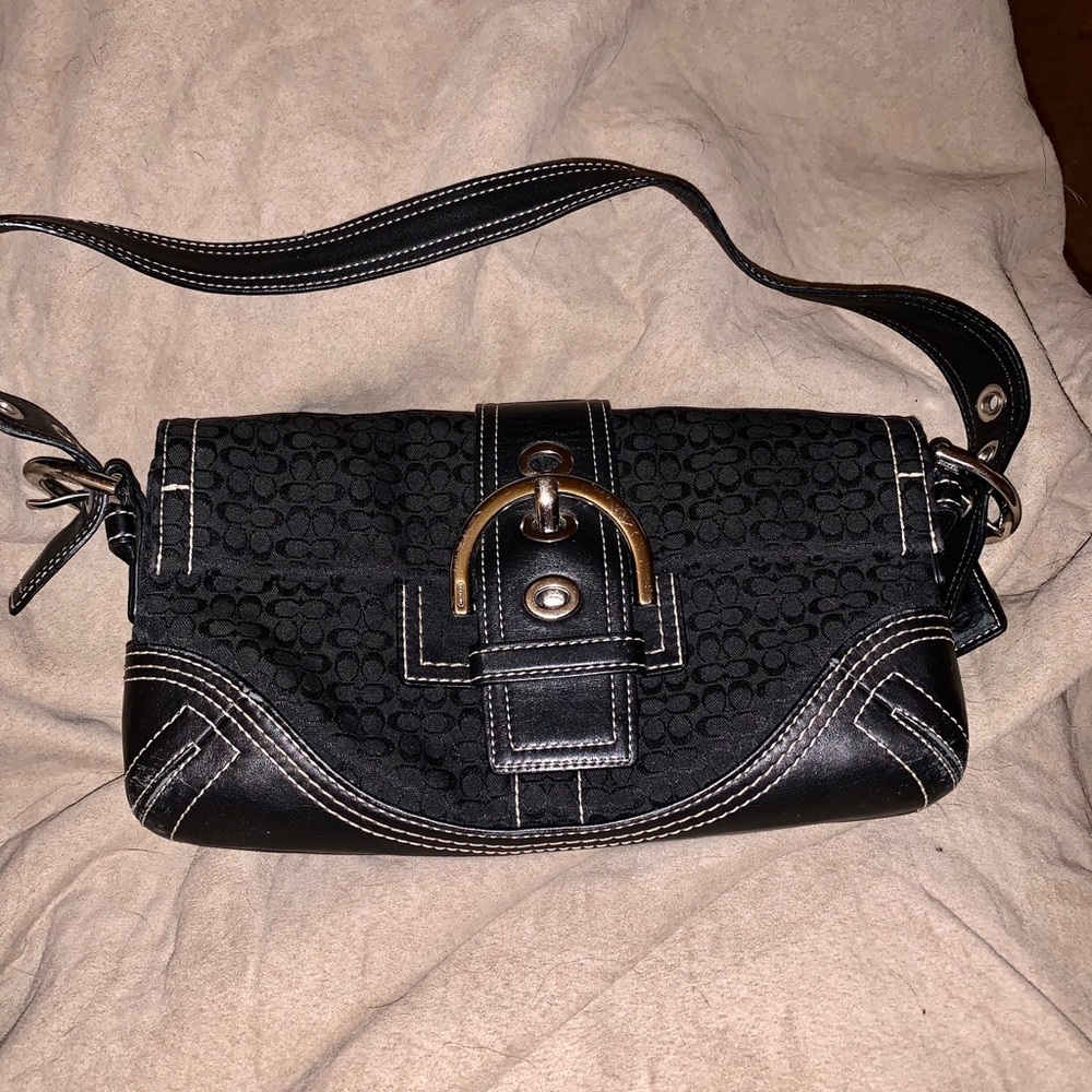 Coach Mini SOHO buckle flap black handbag.